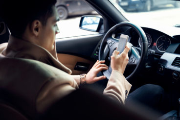 distracted driver using mobile phone - distraction when driving