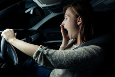 tired driver in the dark - driving in the dark
