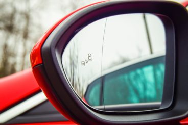 Blind spot warning monitor on side view mirror