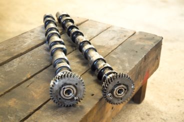 camshafts on wooden bench