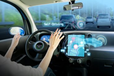 animation of driver keeping hand off the wheel as the car drives itself
