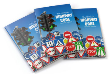 three highway code booklets on a white background