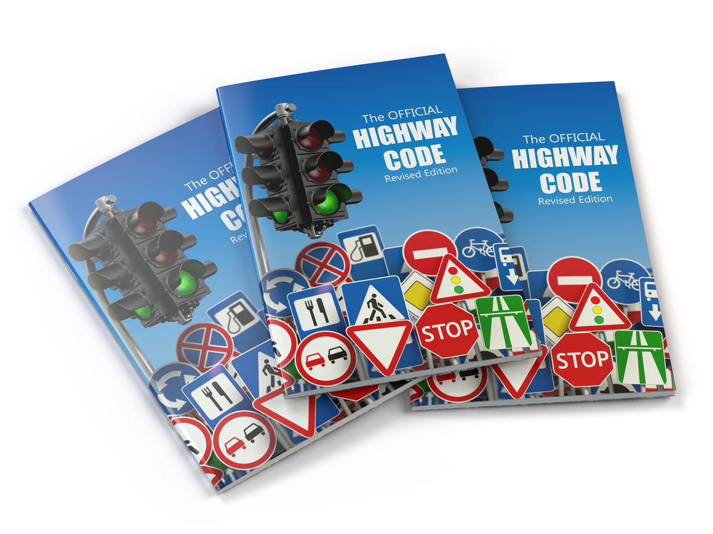 three highway code booklets on a white background