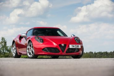 Red Alpha Romeo 4c Spider parked up