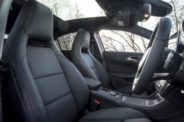 the black leather interior of the Mercedes benz a class amg hatchback