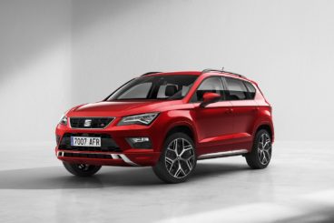 metallic red SEAT Ateca isloated on white background