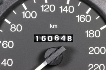 close up of car speedometer 160,648 miles