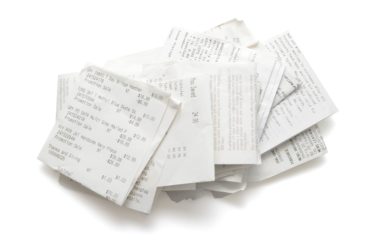 pile of receipts isolated on white background