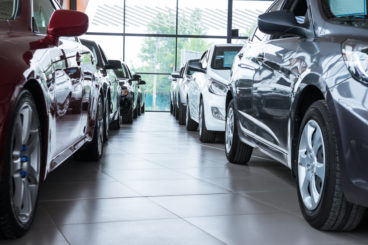 cars lined up in a showroom