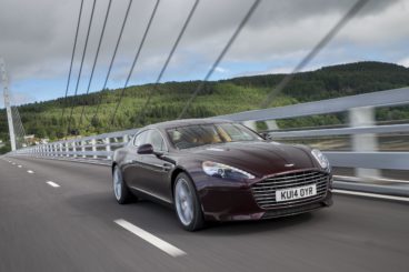 a aston martin aston martin rapide s saloon driving over bridge
