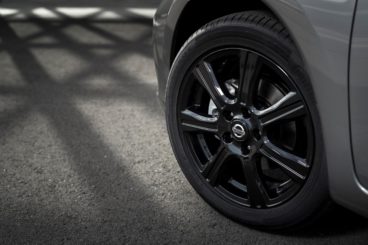 close up picture of a front tyre of a nissan pulsar hatchback on tarmac