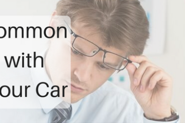 The Most Common Problems with Financing Your Car title with man in a suit wearing glasses