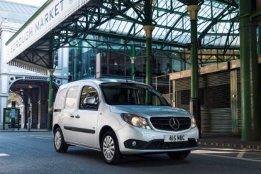 silver mercedes citan van parked outside market in a city setting