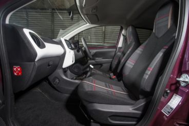 the black and purple cloth interior of the peugeot 108 hatchback