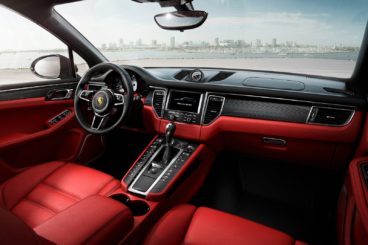 the red leather interior of the porsche macan estate