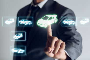Businessman is researching where to find car lease deals
