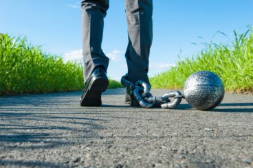 chain of iron ball attached to the foot