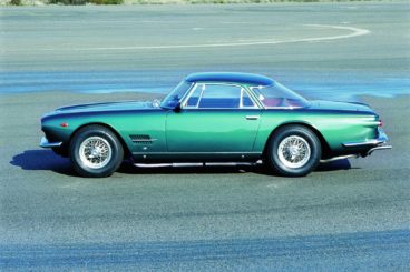 Maserati 5000GT in green on a race track