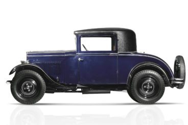 Blue Peugeot 201 on a white background
