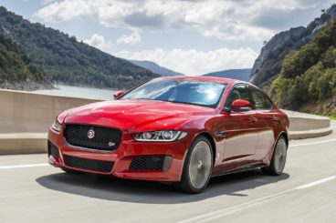 Red Jaguar XE driving