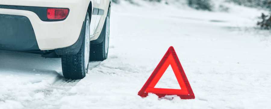 Hazard sign by car