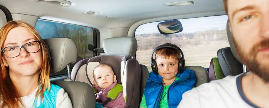 Road trip - Family with parents and children in car