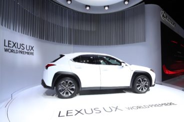 a white lexus UX at the geneva motor show