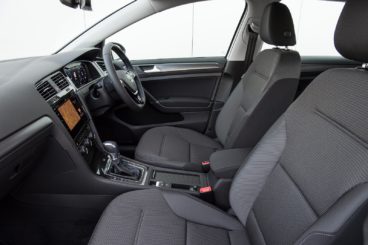 the black leather interior of the volkswagen e golf