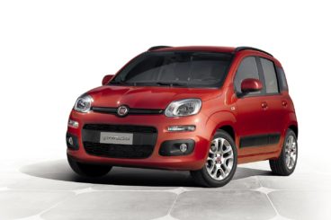 a red fiat panda isolated on a white/silver background
