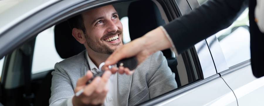 Top car leasing - Man sitting in new car