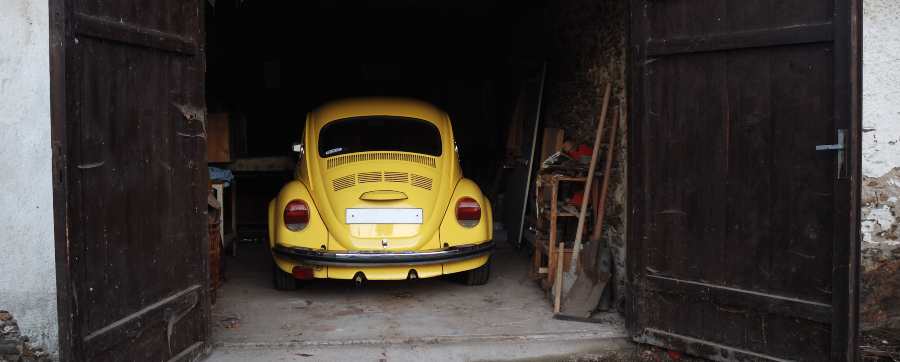 An old model Beetle stored in a shed