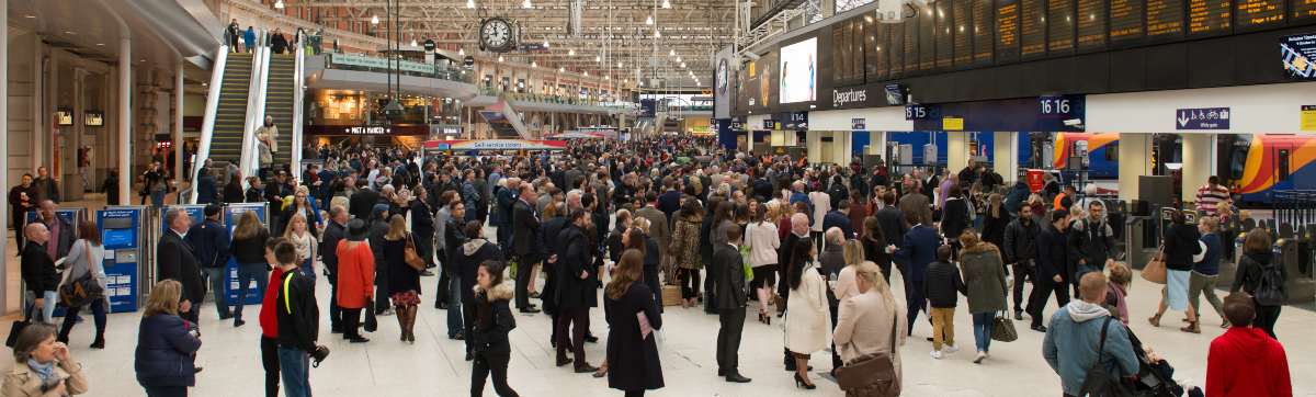 Crowds of people at UK train station
