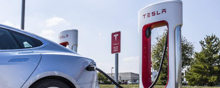 Tesla Model 3 at a Tesla Supercharger