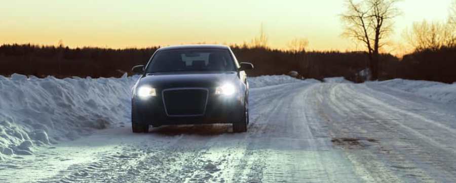 Driving in extreme weather - car driving in heavy snow