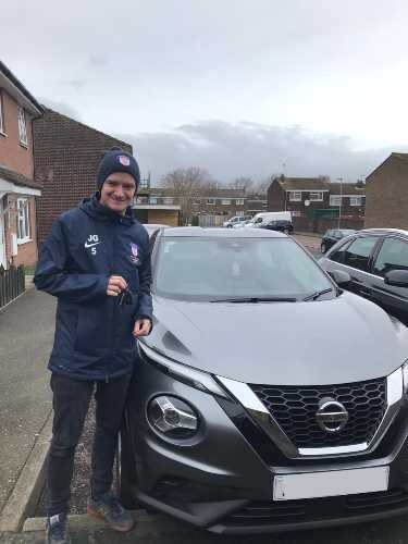 OSV Customer standing next to his new Nissan