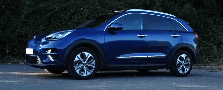 The Kia e-Niro parked, showing off the side of the vehicle