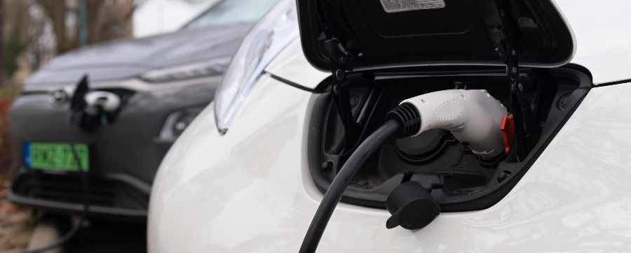 an electric car showing its charging section
