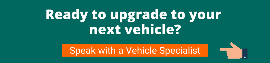 Green background with white text that reads Ready to upgrade to your next vehicle? Speak with a Vehicle Specialist 